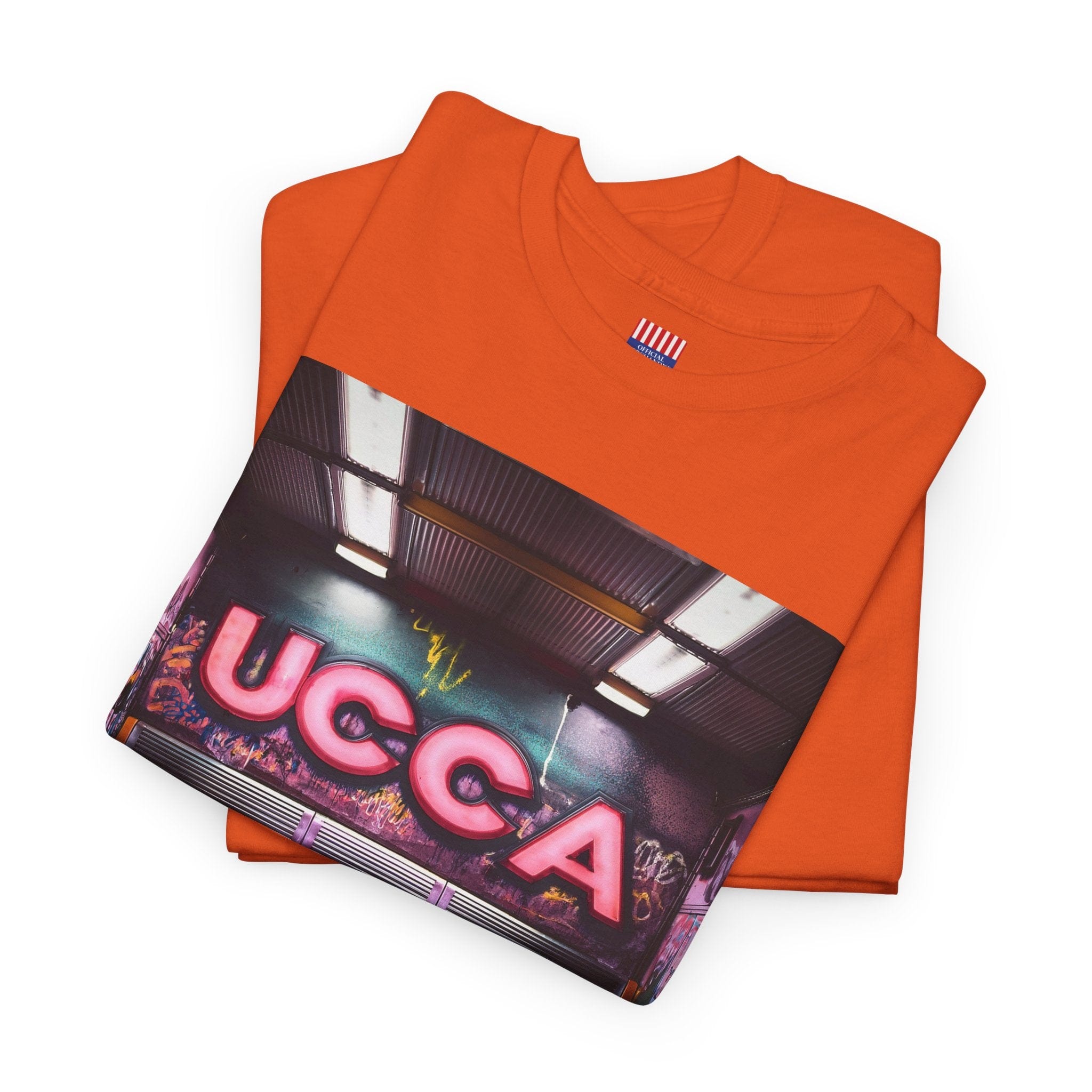Step Back in Style: Retro Vibes, Modern Threads with a UCCA Edge - Unisex Heavy Cotton Tee T-Shirt